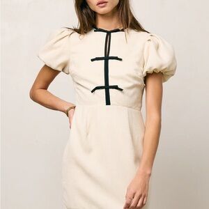 Bohme Cream Mini Dress with Black Bow Accents